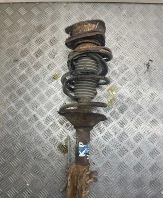 Subaru Forester SF Front shock absorber with coil spring