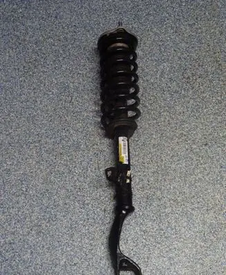 Front shock absorber with coil spring