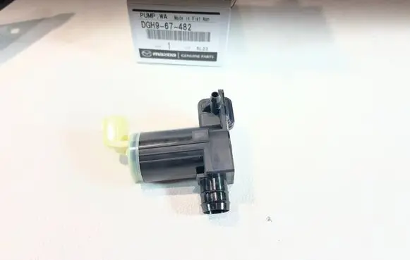 Mazda 3 Windshield washer spray nozzle DGH967482