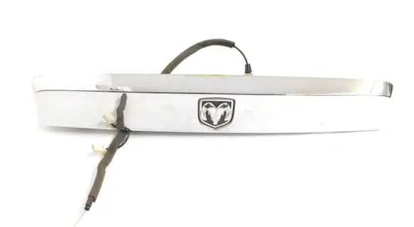 Trunk door license plate light bar