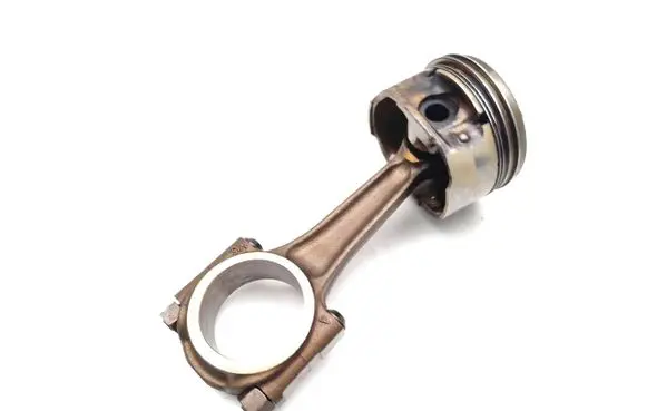 Piston with connecting rod