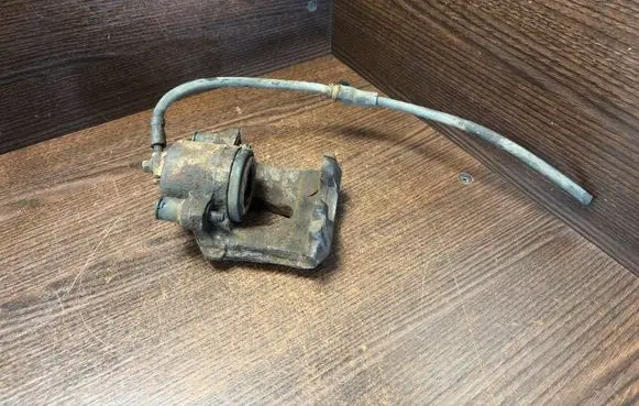 Volkswagen Caddy Front brake caliper 1K0615124D