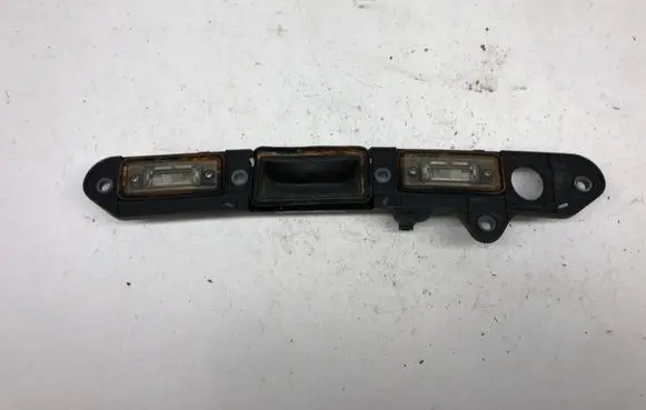 Volkswagen PASSAT B6 Trunk door license plate light bar 1T0827574L