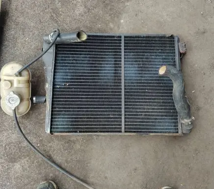 BMW 5 E12 Coolant radiator 11116390