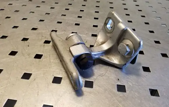 Rear door upper hinge