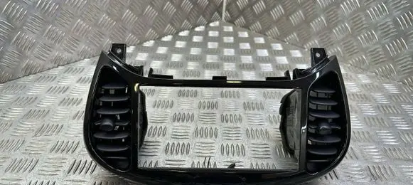 Nissan Juke I F15 Dash center air vent grill 687501KE0A