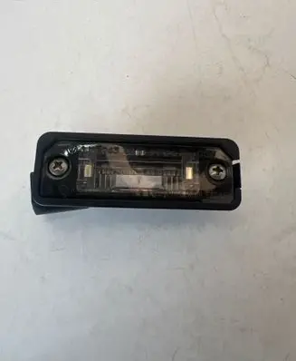 Volkswagen Golf V Number plate light 1J6943021B