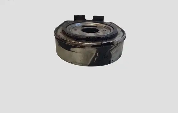 KIA Carens I Oil filter mounting bracket