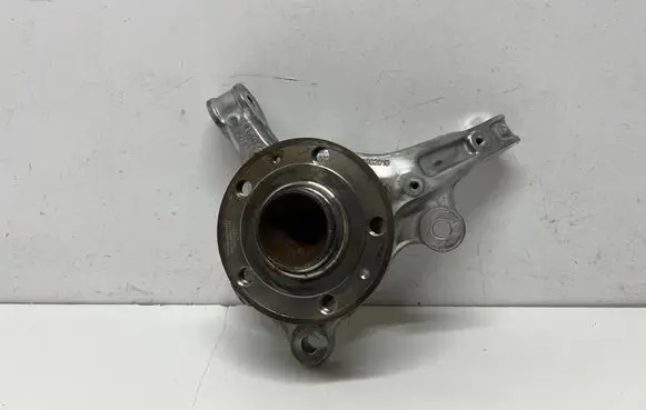 Front wheel hub spindle knuckle