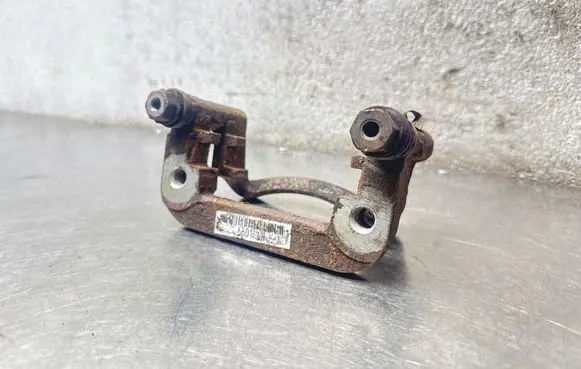 Opel Insignia A Brake caliper pad carrier rear 6601LH