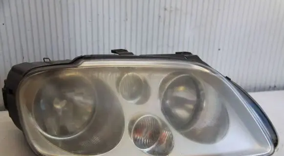 Volkswagen Touran I Headlight/headlamp 1T0941006F