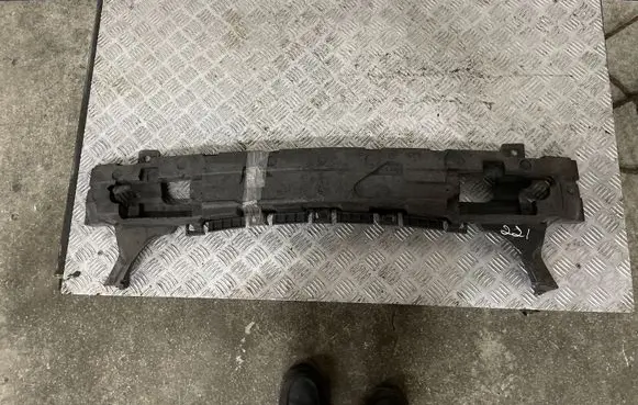 Top upper radiator support slam panel
