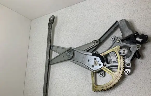 Subaru Legacy Front door window regulator with motor 311200