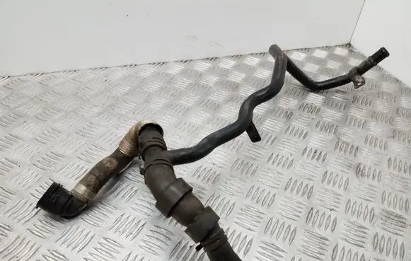 Volkswagen Golf VII Engine coolant pipe/hose 04L121065
