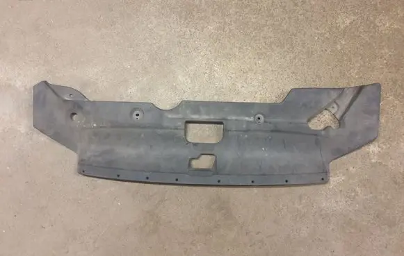 Engine bonnet/hood lock trim molding