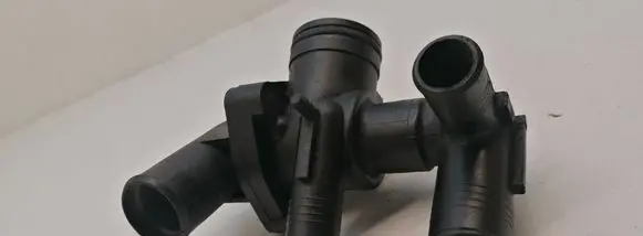 Thermostat/thermostat housing
