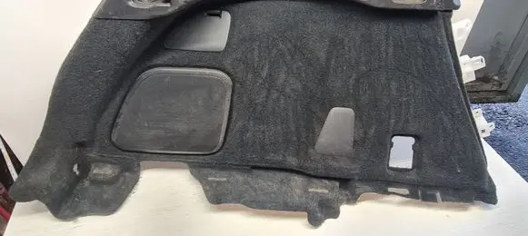 Trunk/boot lower side trim panel