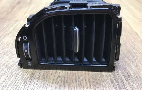KIA Sportage Dash center air vent grill 97410F1AA0