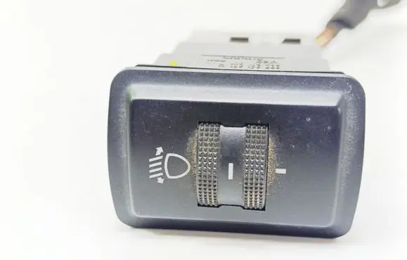 Headlight level height control switch