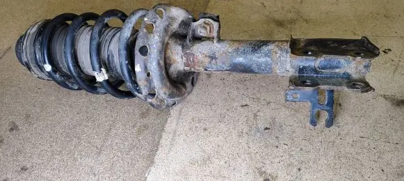 Opel Meriva B Front shock absorber with coil spring 