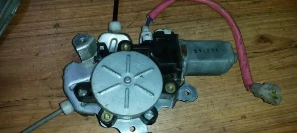 Mitsubishi Lancer Front door window regulator motor