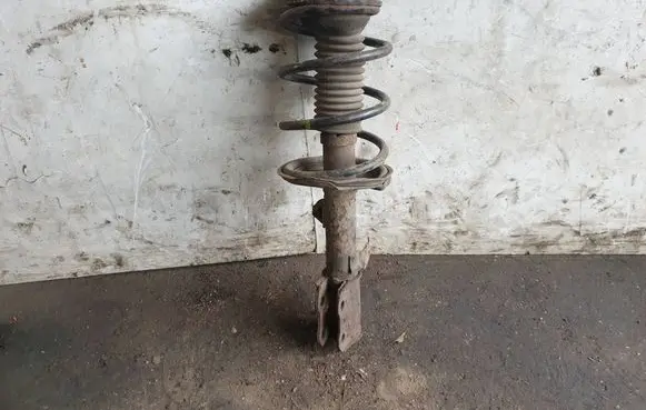Toyota Corolla Verso E121 Front shock absorber with coil spring