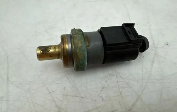 Volkswagen Golf VII Coolant temperature sensor 8K0973702