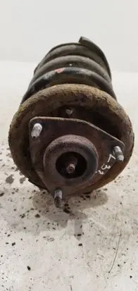 Mitsubishi Lancer X Front shock absorber with coil spring