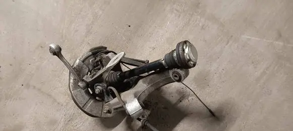 Rear wheel hub spindle/knuckle