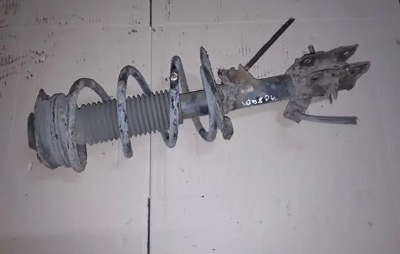 Nissan X-Trail T31 Front shock absorber with coil spring NOCODE