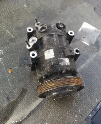 KIA Optima Air conditioning (A/C) compressor (pump) 97701D7100