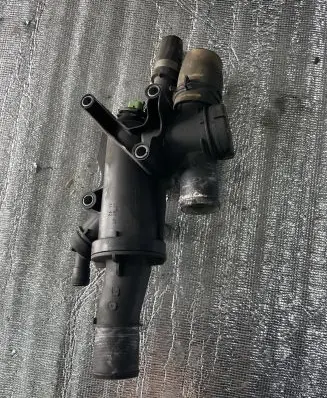Thermostat/thermostat housing