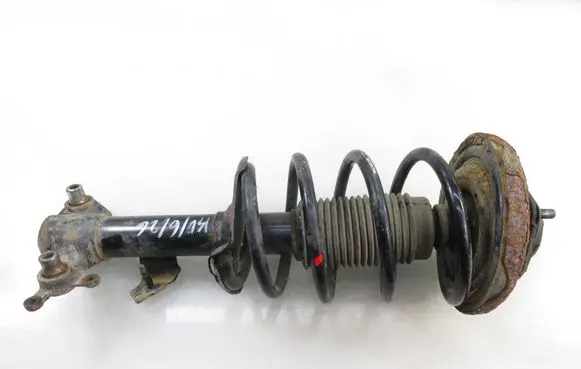 Nissan Primera Front shock absorber with coil spring 