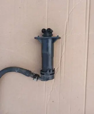 Headlight washer spray nozzle