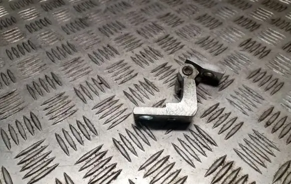 Rear door upper hinge