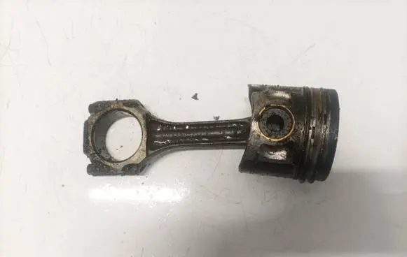 Piston with connecting rod