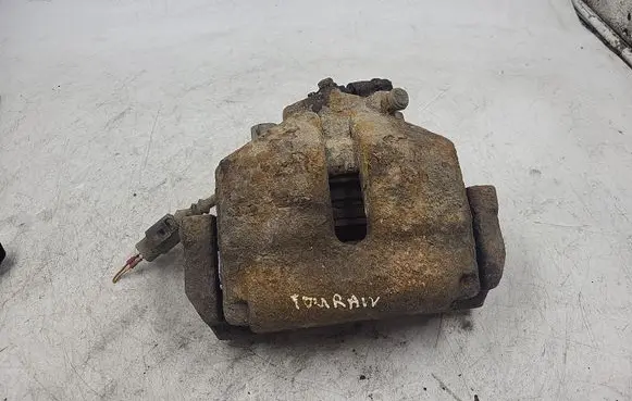 Volkswagen Touran I Front brake caliper 