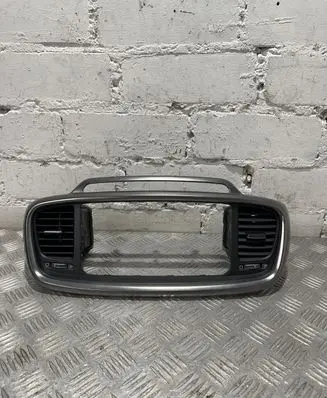 Dash center air vent grill
