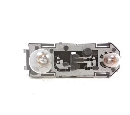 Tail light bulb cover holder
