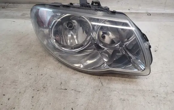 Chrysler Voyager Headlight/headlamp 04857830AC