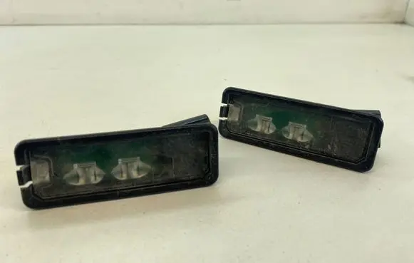 Volkswagen PASSAT CC Number plate light 1K8943021C