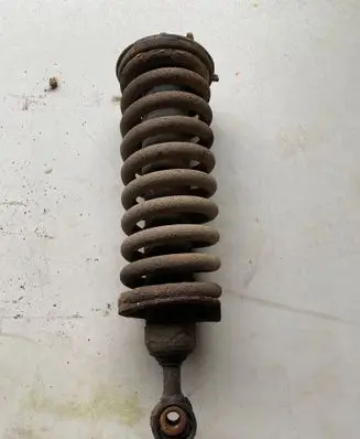 Front shock absorber with coil spring