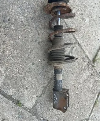 Dacia Logan I Front shock absorber/damper