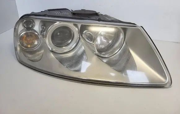 Volkswagen Touareg I Headlight/headlamp 89308481