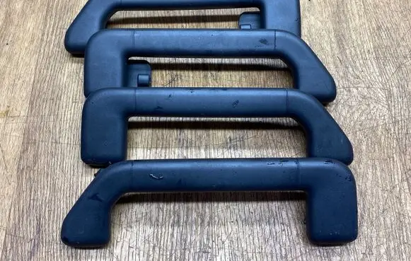 Volkswagen Touareg II A set of handles for the ceiling 7P0857644B