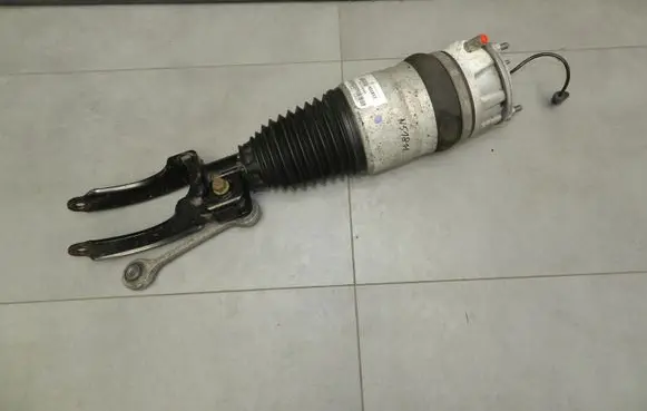 Volkswagen Touareg II Air suspension front shock absorber 7P6616040H