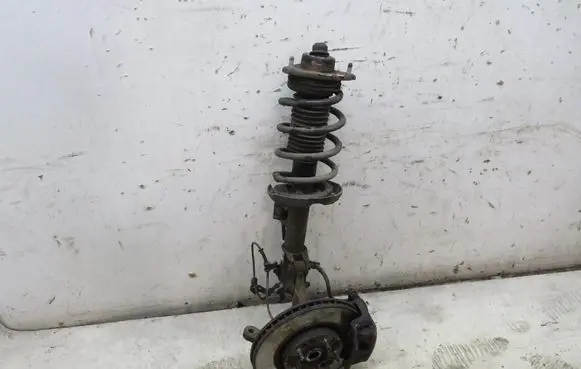 KIA Carens III Front wheel hub spindle knuckle GMAUTO4574097