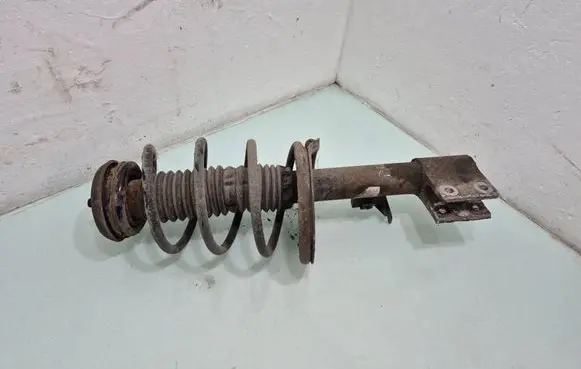 Citroen C4 I Front shock absorber with coil spring 