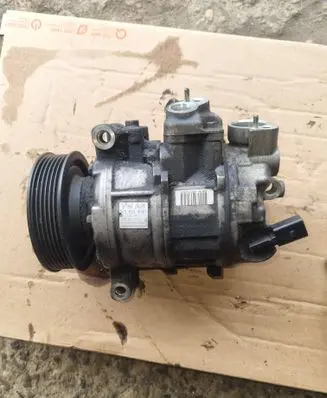 Volkswagen Golf SportWagen Air conditioning (A/C) compressor (pump) 1K0820859T GE4471501931