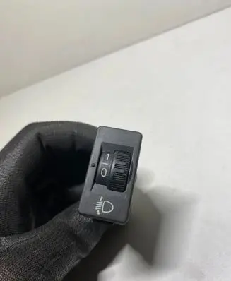 Headlight level height control switch
